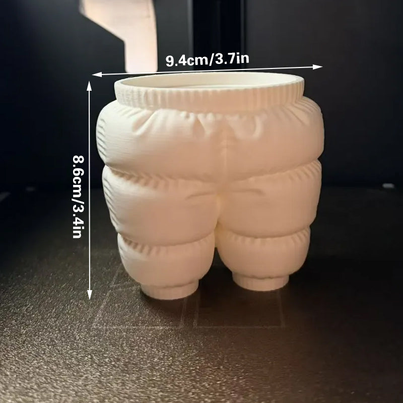 A unique 3D printed down-filled pants pen holder desktop organizer, white.