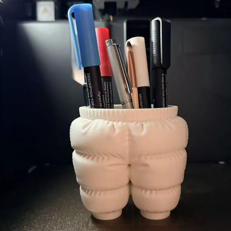 A unique 3D printed down-filled pants pen holder desktop organizer, white.